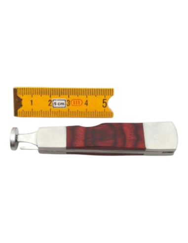 Outil pipe métal et bois rouge forme couteau